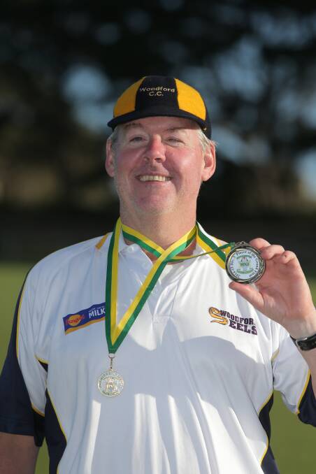 Rick McInerney celebrates a premiership and player of the final honours after Woodford's 2015 division three grand final win.