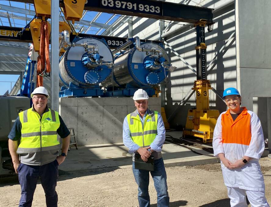 On the job: Joel Saywell (left), Kevin Banner and Mollie Smith outside Midfield Group's new $35 million protein recovery plant, which is taking shape at its Warrnambool headquarters.