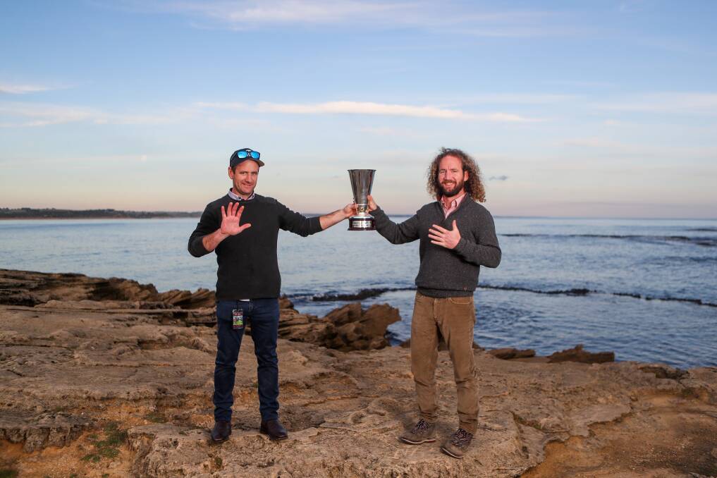 OH BROTHER: The Maher siblings, Declan and Ciaron, enjoy a special moment together on the Warrnambool coastline after Tuesday's Grand Annual Steeplechase win. Picture: Morgan Hancock 