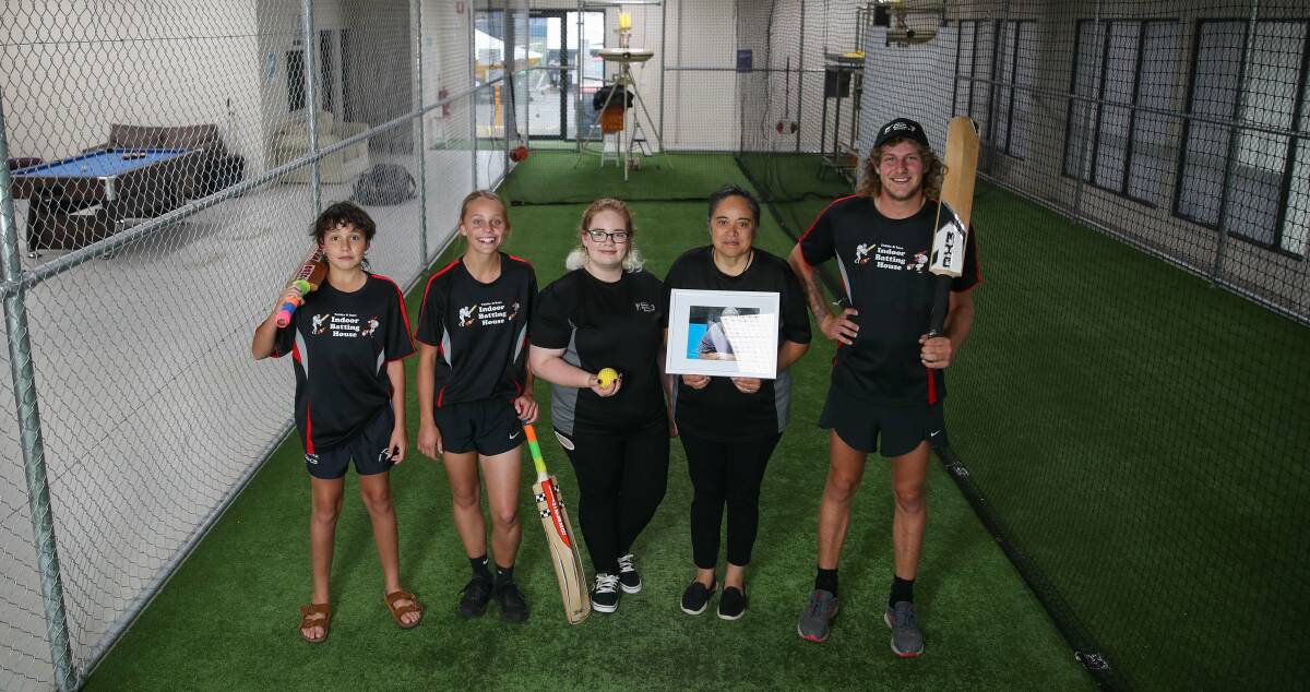 Batting on: Harrison Smith, Hannah Rooke, Kate Lowater, Kat Taylor and Jarryd Walsh at the indoor cricket facility that Kat has vowed to continue operating in honour of her late husband 'Tubbie'. Picture: Morgan Hancock