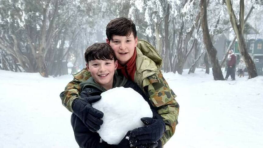 Josh and brother Aaron having fun in the snow. Picture supplied