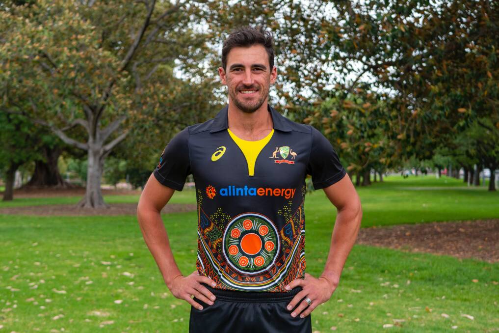 The design: Australian star Mitchell Starc models the new T20 shirt which includes Fiona Clarke's design. Pictures: Cricket Australia