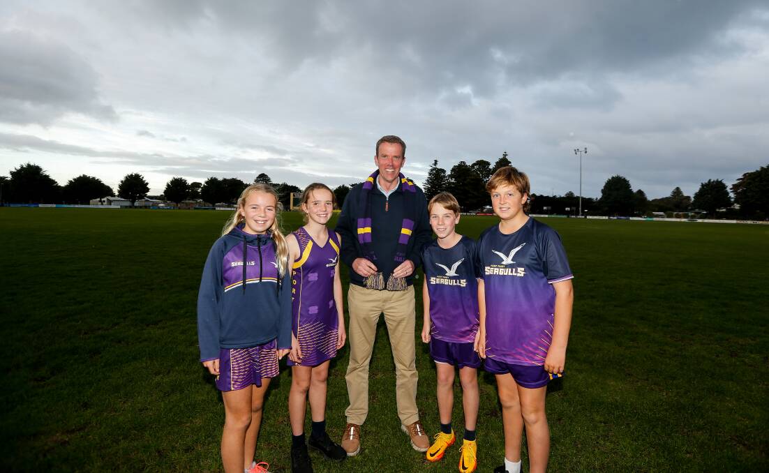 Pledge: Dan Tehan, flanked by Port Fairy juniors Lexie Dwyer, Lena Watty, Charlie Murray and Max Dance, announced a re-elected Coalition government would tip $3.2 million into a redevelopment of Gardens Oval facilities. Picture: Anthony Brady
