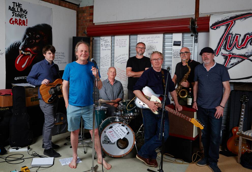 Rolling on: Richard Crawley, 70, and members of Rolling Stones tribute band Tumbling Dice.