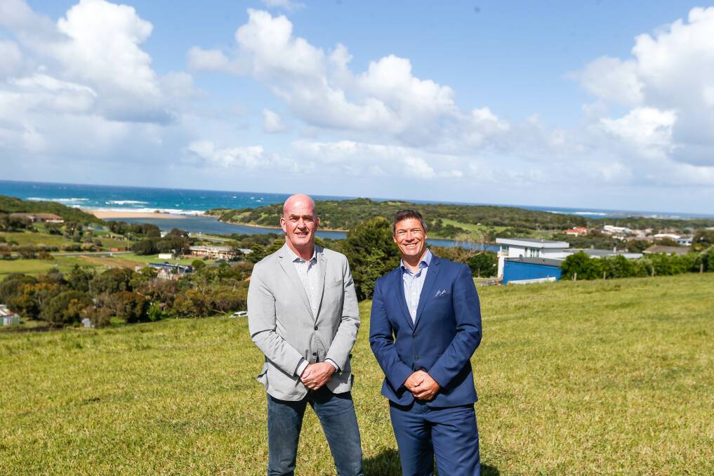 Up for grabs: Tom Lindsey and Matthew Wood stand where a new 420-lot residential subdivision on the north side of Hopkins Point Road will be opened up later this month. Picture: Anthony Brady 