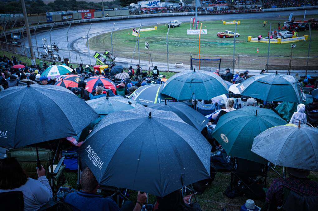 Umbrellas were up at Premier Speedway on Sunday night. Picture by Sean McKenna