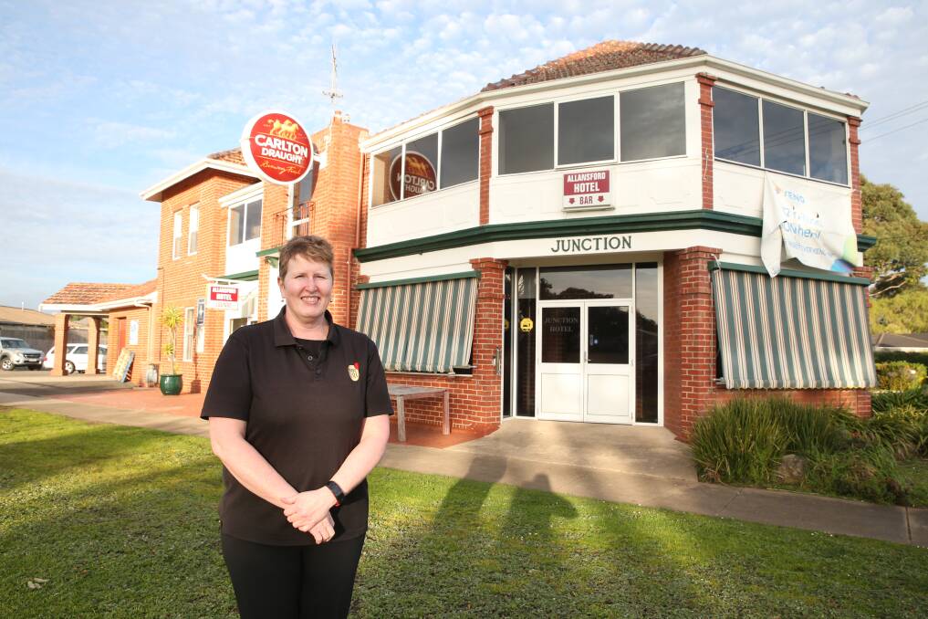 Missing the locals: Allansford's Junction Hotel owner Diana McLean says no footy and social restrictions have made life tough but take away services have ensured contact with the locals. Picture: Mark Witte