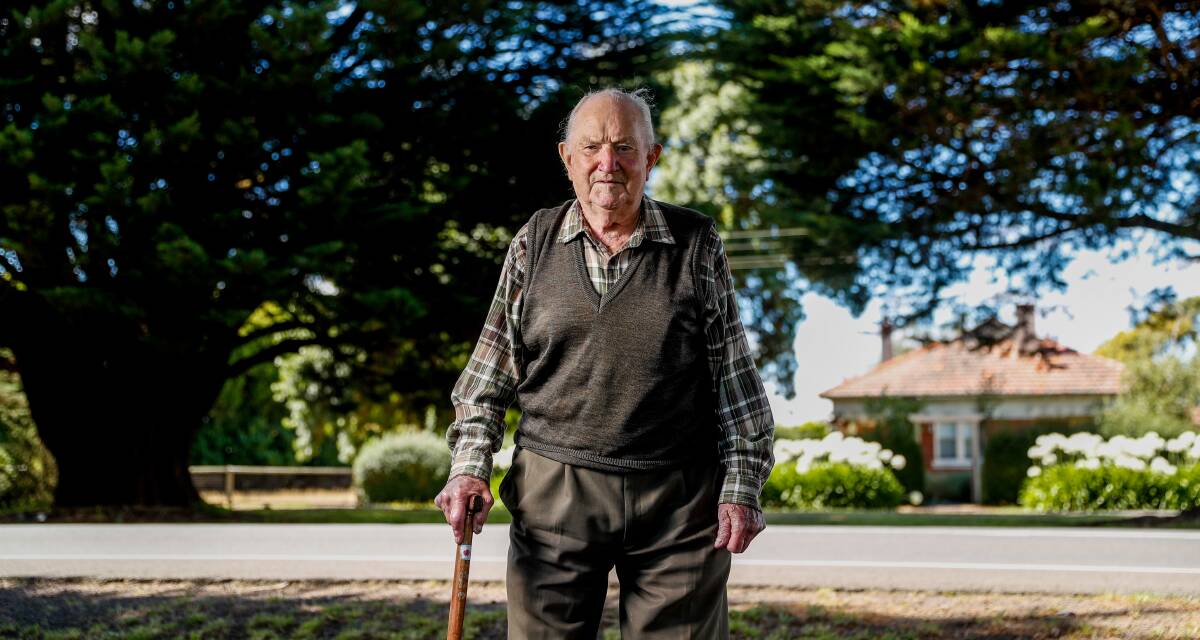 Jim Vale was a long-time member of Mortlake's RSL. He was pictured in the town's avenue of honour in 2021 after a long-running battle over the future of the trees was resolved. Picture by Morgan Hancock