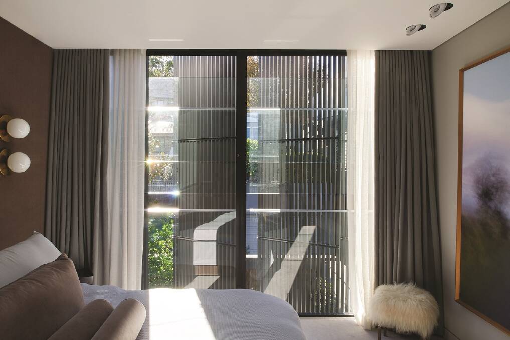 Privacy regulations were overcome with architectural automated louvres that obscure the interior from neighbouring properties.