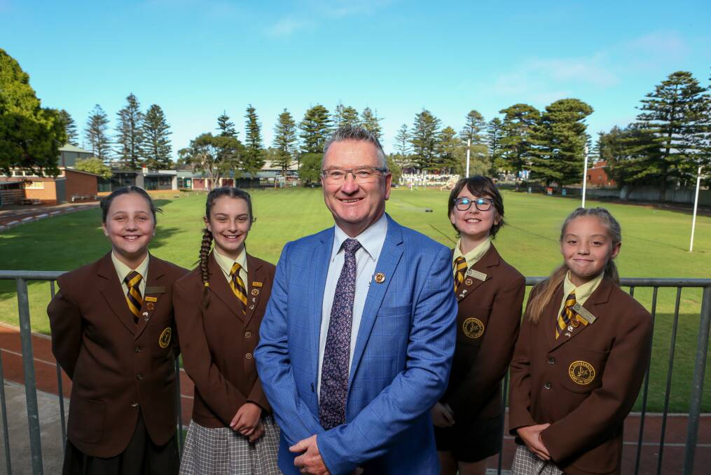 END OF AN ERA: Principal Peter Auchettl is retiring on Thursday after 15 years in the position. Here he is with students Sophie Smith, Harper Burgess-Metal, Charlotte Eldridge and Archie Buchanan. Picture: Chris Doheny