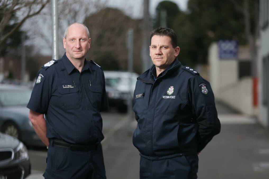 Acting Senior Sergeant Craig Merry and Liquor licensing inspector Brett Jackson, police say pub owners and punters are on notice after recent unruly behaviour at night spots Picture: Chris Doheny