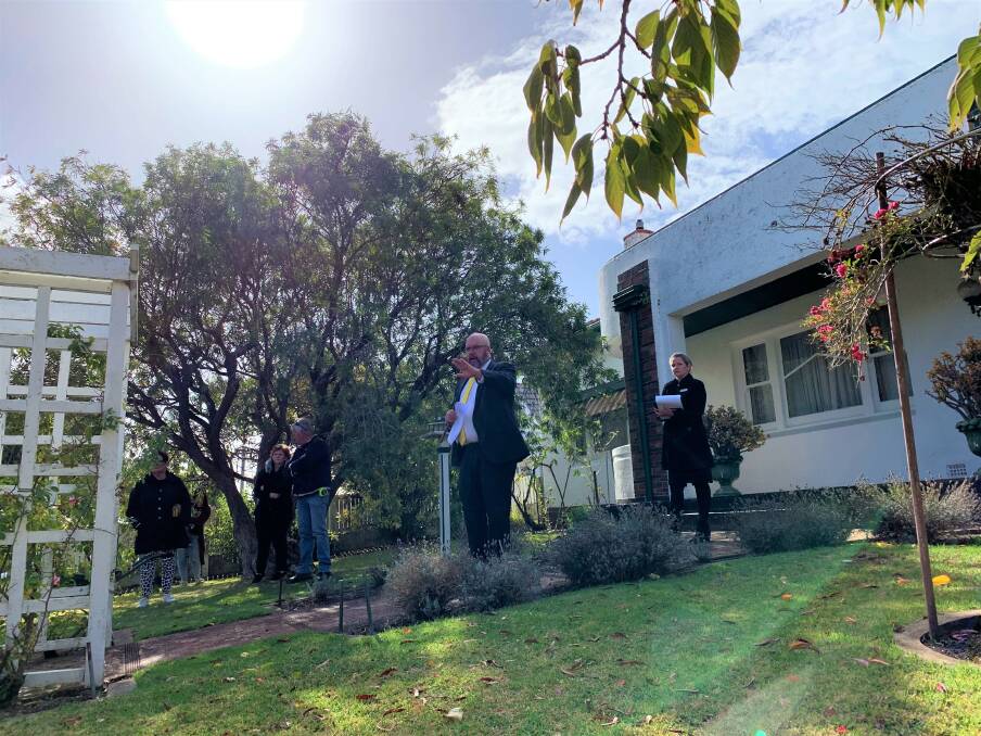 SOLD: Auctioneer Jason Thwaites, from Ray White Warrnambool, at Warrnambool's 32 Howard Street, which sold under that hammer for $775,000 on Saturday. Picture: Jessica Howard
