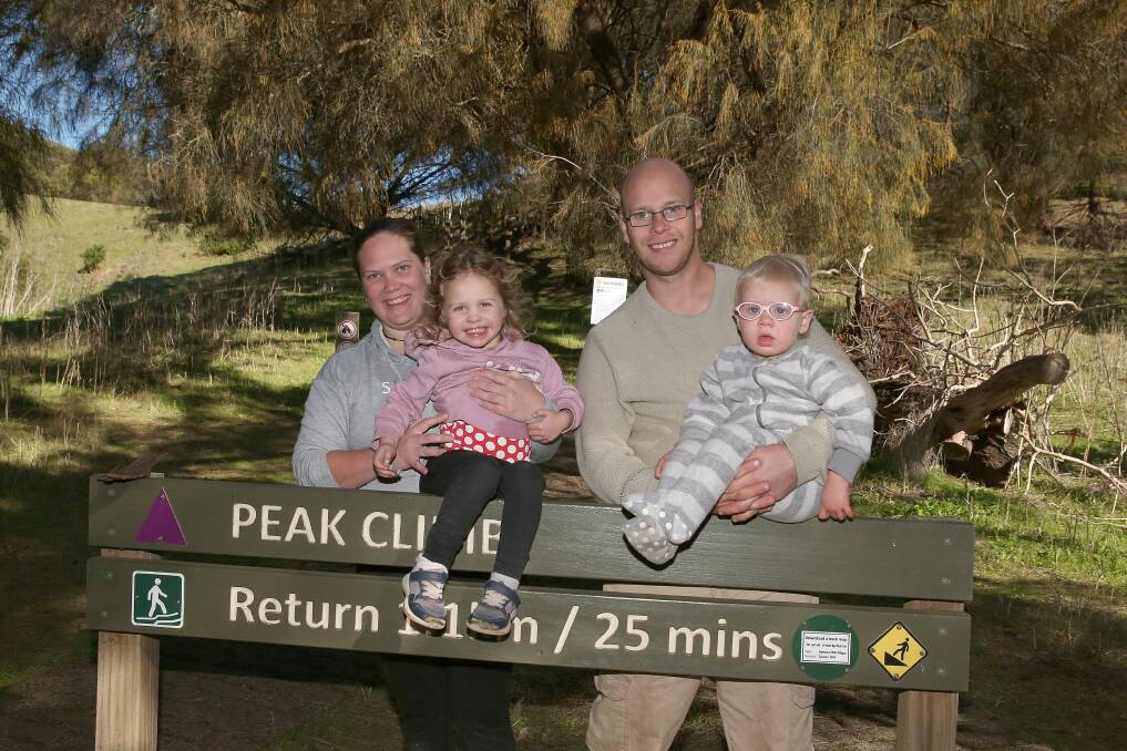 SIGHT-SEEING: Warrnambool family Belinda and Kris Brown with Alexa, 3 and Lillyann, 2, looking for emus and koalas at Tower Hill Wildlife Reserve. Picture: Mark Witte