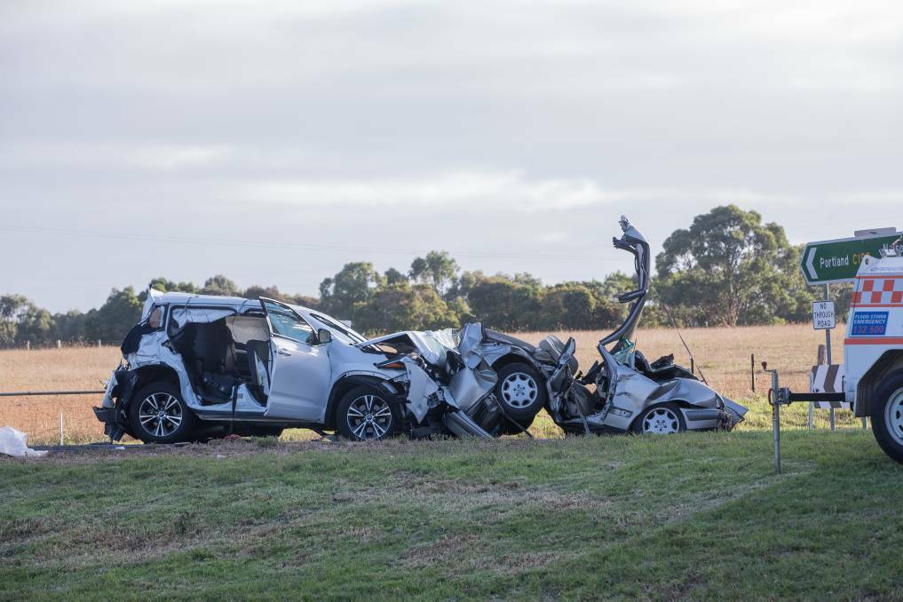 TRAGEDY: The scene of the four-vehicle accident which claimed the life of a woman and left four others in hospital. Pictured is the Toyota Kluger and the Mercedes Benz sedan.