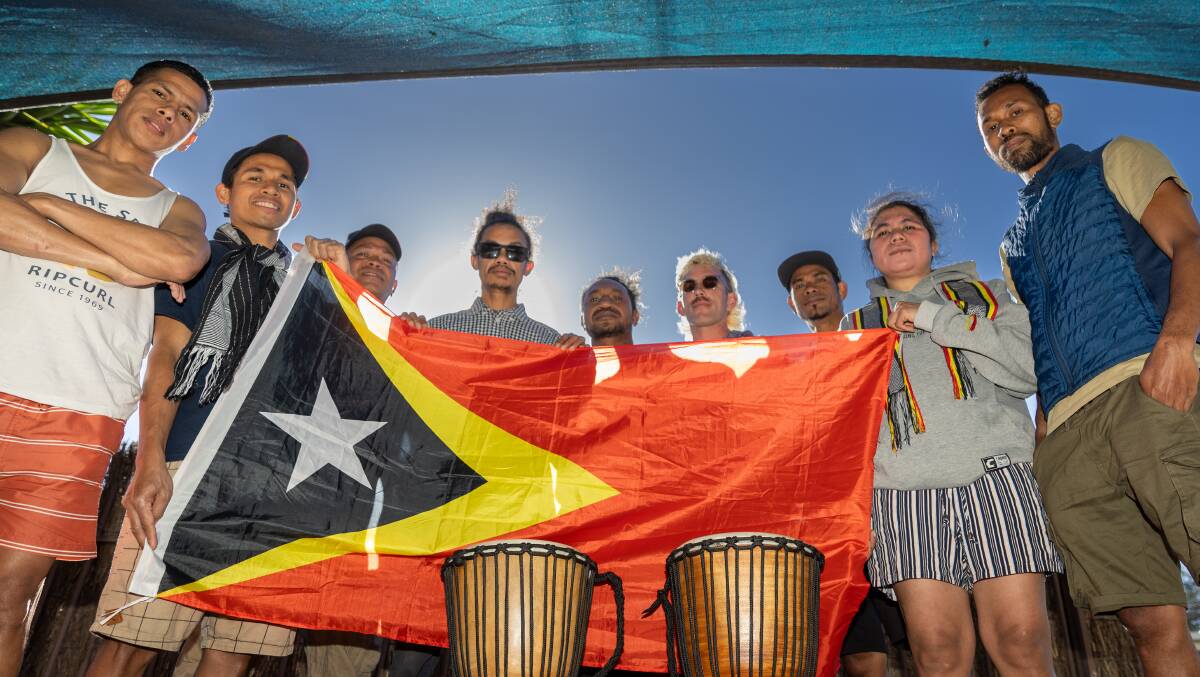 Killarney musician Billy Barker with David Darba and members of the Timor-Leste community who will perform at this year's Port Fairy Folk Festival. Picture by Eddie Guerrero.