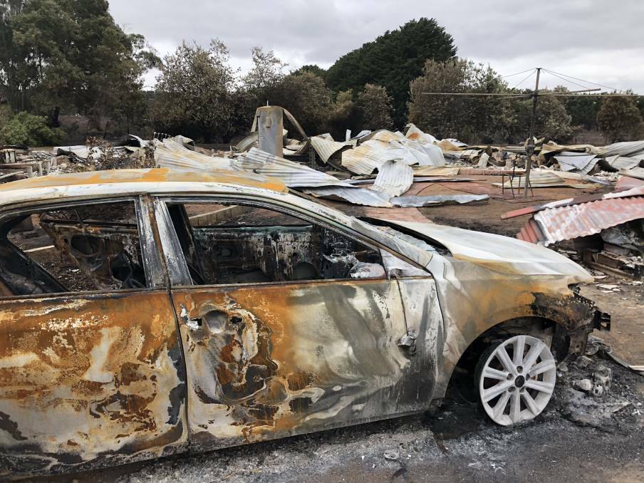 NOTHING LEFT: A burnt-out car in front of what was once a family home before the Terang bushfire that tore through Elingamite.