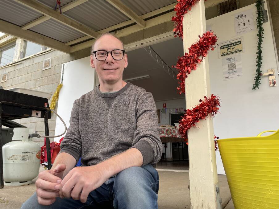 STAYING POSITIVE: Adrian Everitt, who has spent 20 days living out of his car while job seeking, attended a community Christmas lunch at Warrnambool Showgrounds.