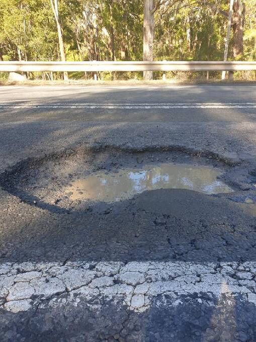 CAUTION: A large deep pothole caused significant damage to multiple vehicles on the Princes Highway at Pirron Yallock at the weekend. 