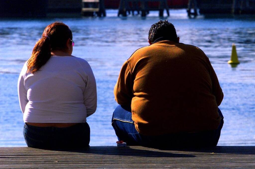 EXPANDING WAISTLINES: More than 70 per cent of men and 56 per cent of men are considered overweight or obese.