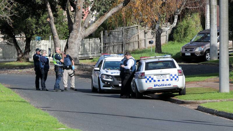 SIEGE: Warrnambool police stake out a house in Crawley Street, Warrnambool, after a siege developed as they were trying to arrest a man. Picture: Rob Gunstone