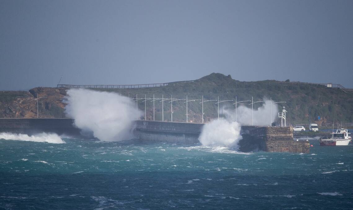 WILD: Gale force winds caused waves to crash over the breakwater at Warrnambool on the weekend. Picture: Patient Eye Imaging, comprising Perry Cho, Engin Torun and Aaron Toulmin.