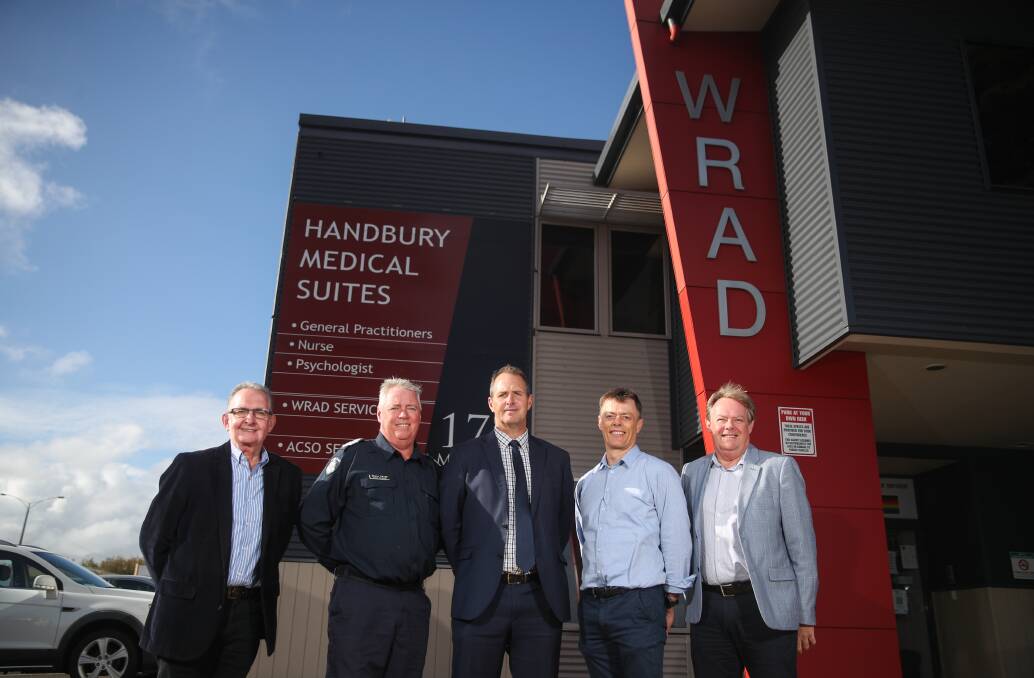 UNITED: WRAD chief executive Geoff Soma, Warrnambool police Senior Sergeant Shane Keogh, South West Healthcare CEO Craig Fraser, WRAD operations manager Mark Powell and Brophy Family and Youth Services CEO Francis Broekman. Picture: Morgan Hancock 
