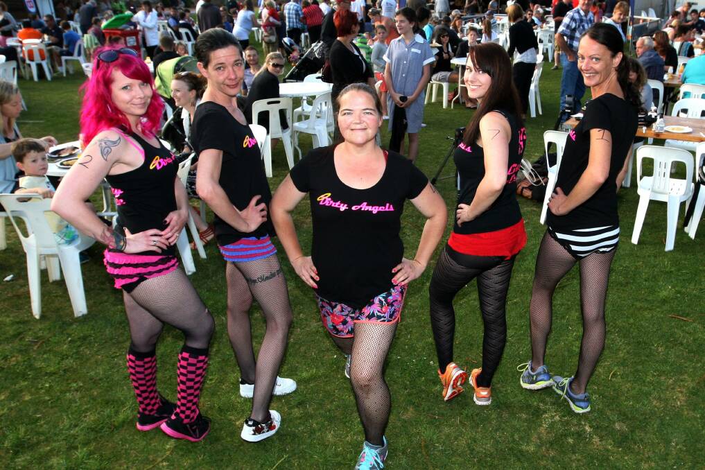 Bianca Gruar and her friends in Dirty Angels Roller Derby team prepare for the Undy 500 at Wunta Fiesta in 2014. 
