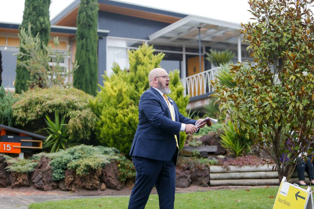 SOLD: Ray White real estate auctioneer Jason Thwaites sold a house in Warrnambool's Altmann Avenue for $920,000 at auction on Saturday. Picture: Anthony Brady