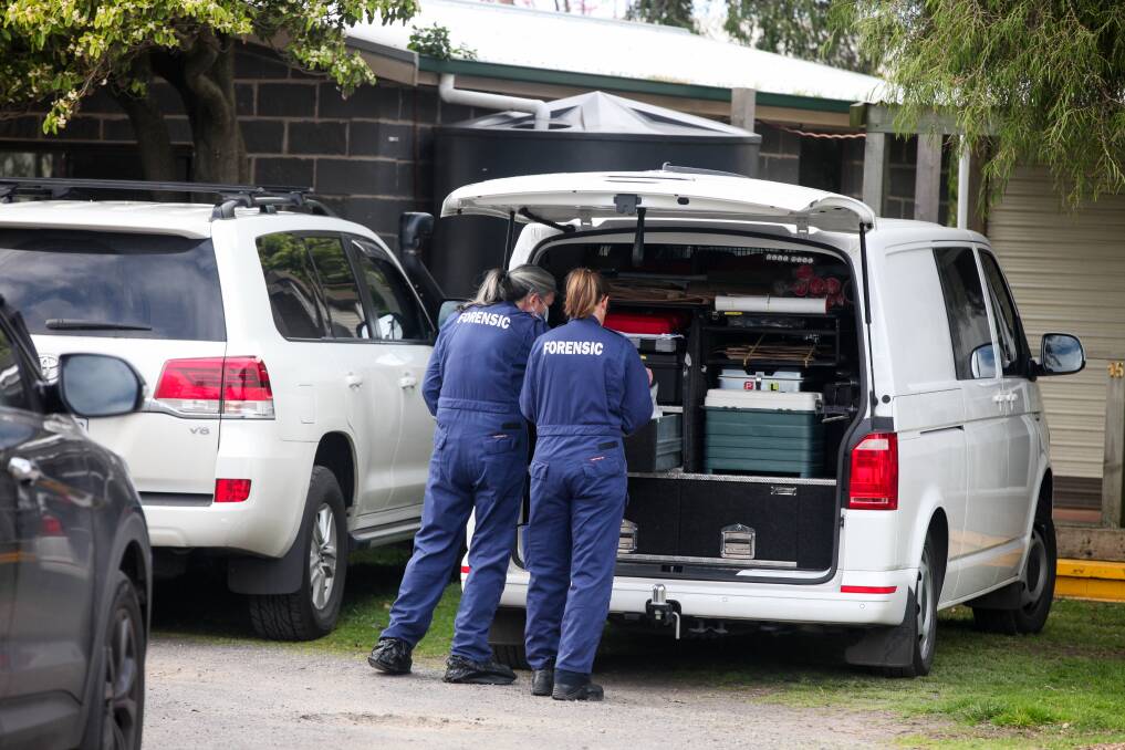 CRIME SCENE: Forensic services officers at Port Fairy following an alleged murder in 2019.