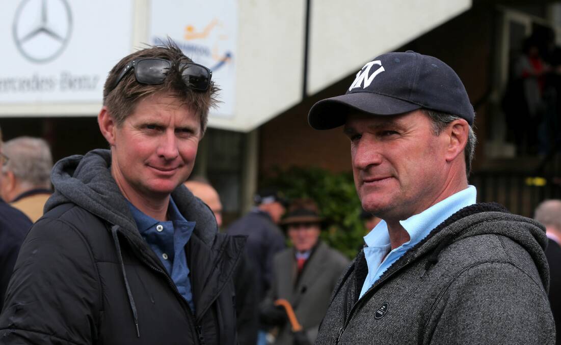 Former Warrnambool trainer Jarrod McLean (left) and Darren Weir in the Warrnambool mounting yard at a May Race Carnival. Picture file