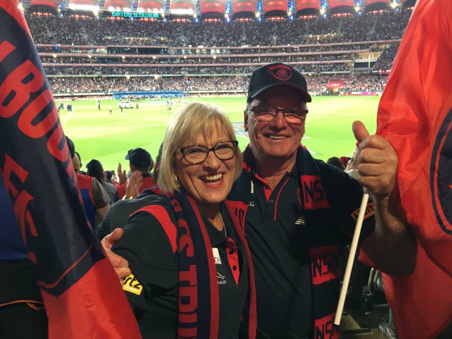 ECSTATIC: Mepunga's Neville and Wilma Wallace were lucky to be in Western Australia to watch Saturday's AFL grand final, where the Melbourne Demons ended a 57-year flag drought.