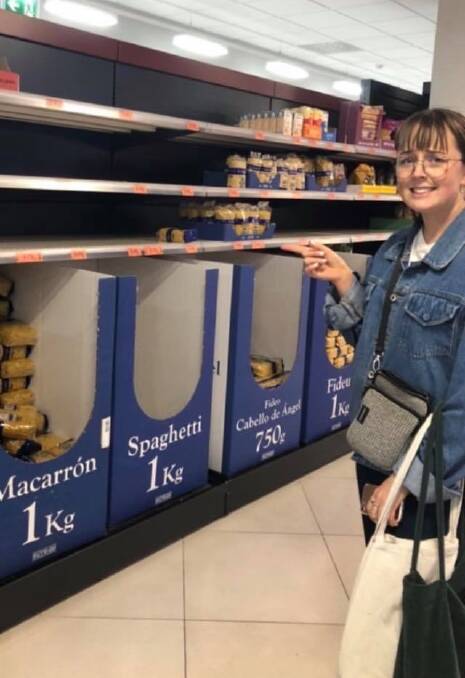 LOCKDOWN: Warrnambool's Ailish O'Donohue, 21, at a Spanish supermarket where the shelves are empty following the coronavirus outbreak. Picture: Supplied