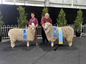Damon and Barry Shalders, Willow Drive English Leicester stud, Grassmere, with the champion ewe and champion ram/supreme of the breed. Picture by Joely Mitchell