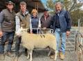 Basin and Tim Jorgensen, Mertex, Liz and Pete Russell, Tullamore Park, and Jason Rice, Elders (second from right), with the top-priced ewe of the sale. Pictures supplied