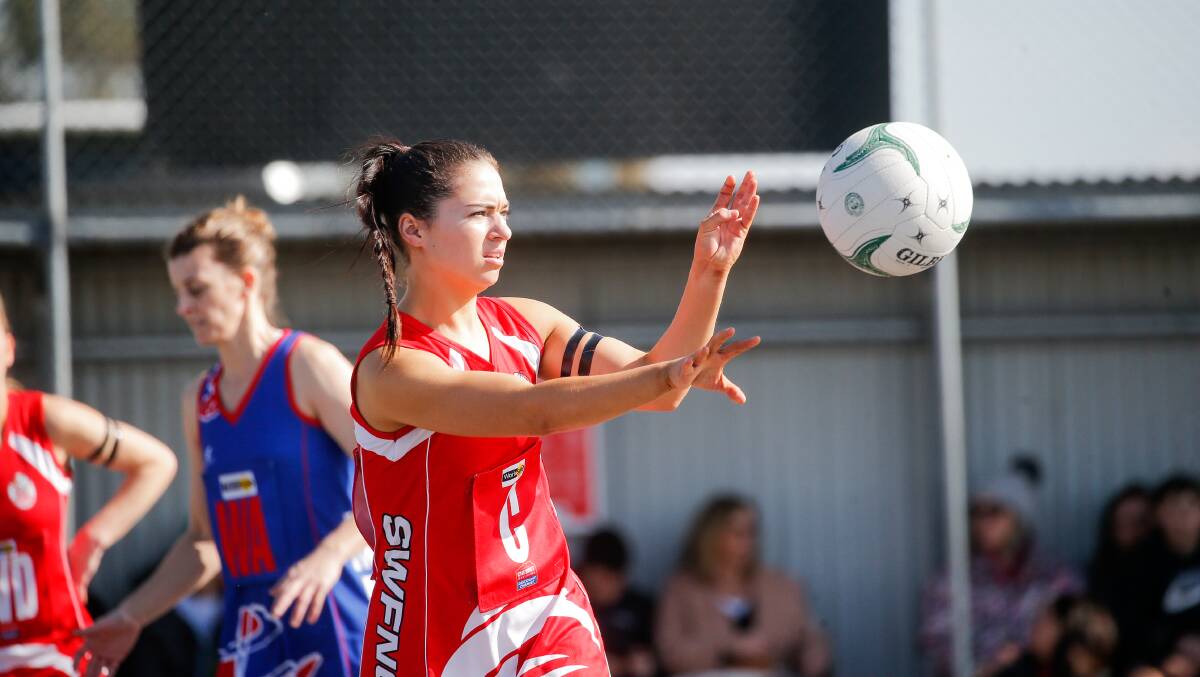 COURT TIME: South Warrnambool's Isabella Rea passes against Terang Mortlake. Picture: Anthony Brady
