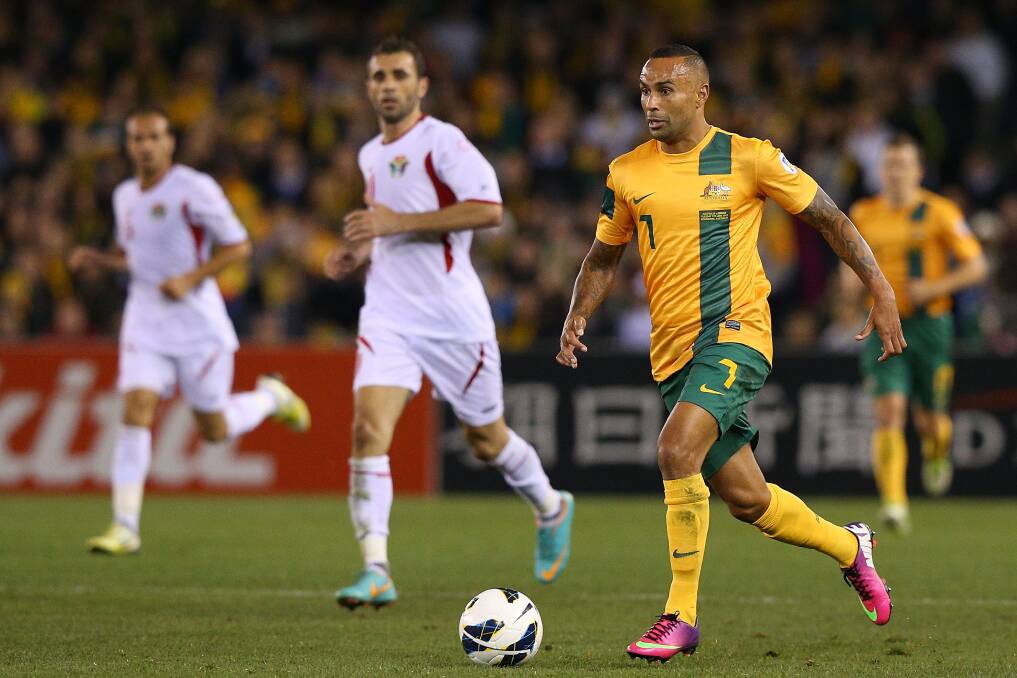 GREEN AND GOLD: Archie Thompson in action for the Socceroos during his international career. Picture: Getty
