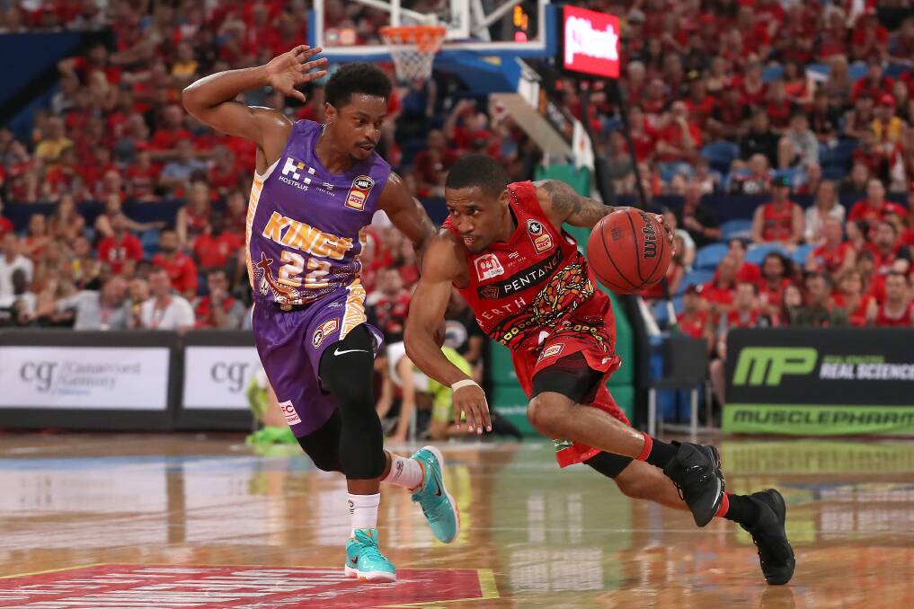 CROWD-PLEASERS: Sydney's Casper Ware and Perth's Bryce Cotton have opted out of their NBL contracts after the salary cap was slashed. Picture: Getty Images