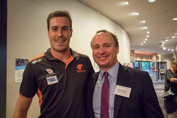 FOOTY LINKS: GWS Giants forward Jeremy Cameron with his player sponsor Andrew McNeil. 
