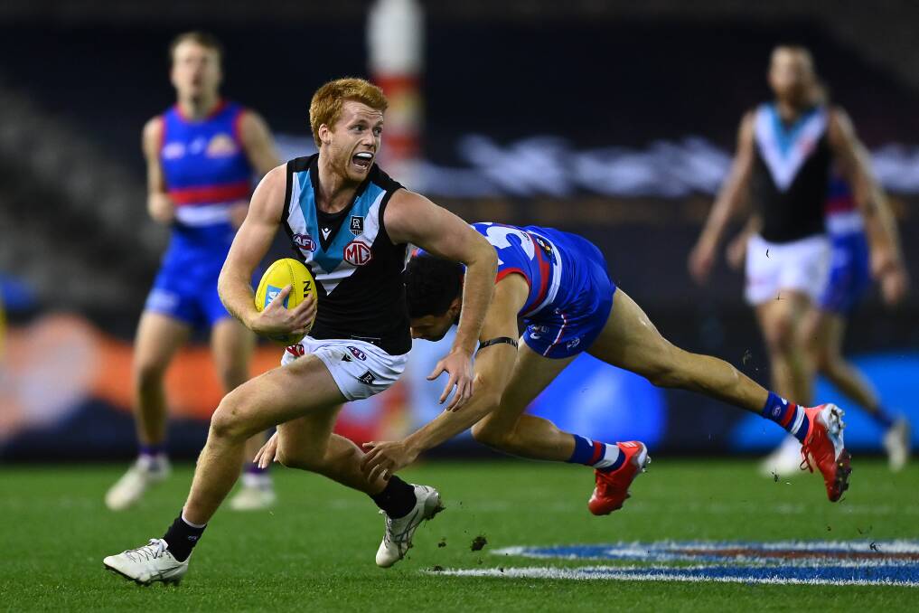 CHARGING ON: Koroit export Willem Drew is part of Port Adelaide's strong midfield. Picture: Getty Images 