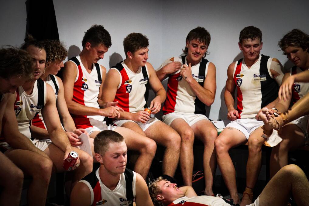 Koroit players relax in the rooms after defeating Warrnambool. Picture by Justine McCullagh-Beasy 