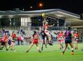 FRIDAY NIGHT LIGHTS: Rucks fly during the South Warrnambool and Warrnambool under 18 game at Reid Oval. Picture: Anthony Brady 
