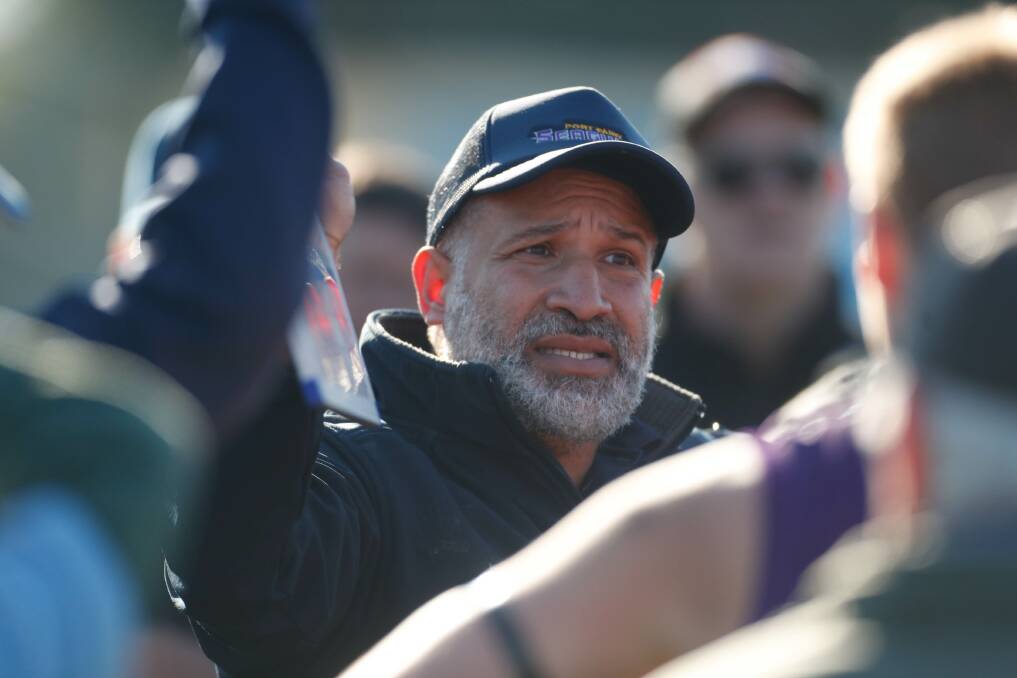 LEADER: Seagulls coach Winis Imbi addresses his players on Saturday. Picture: Chris Doheny 