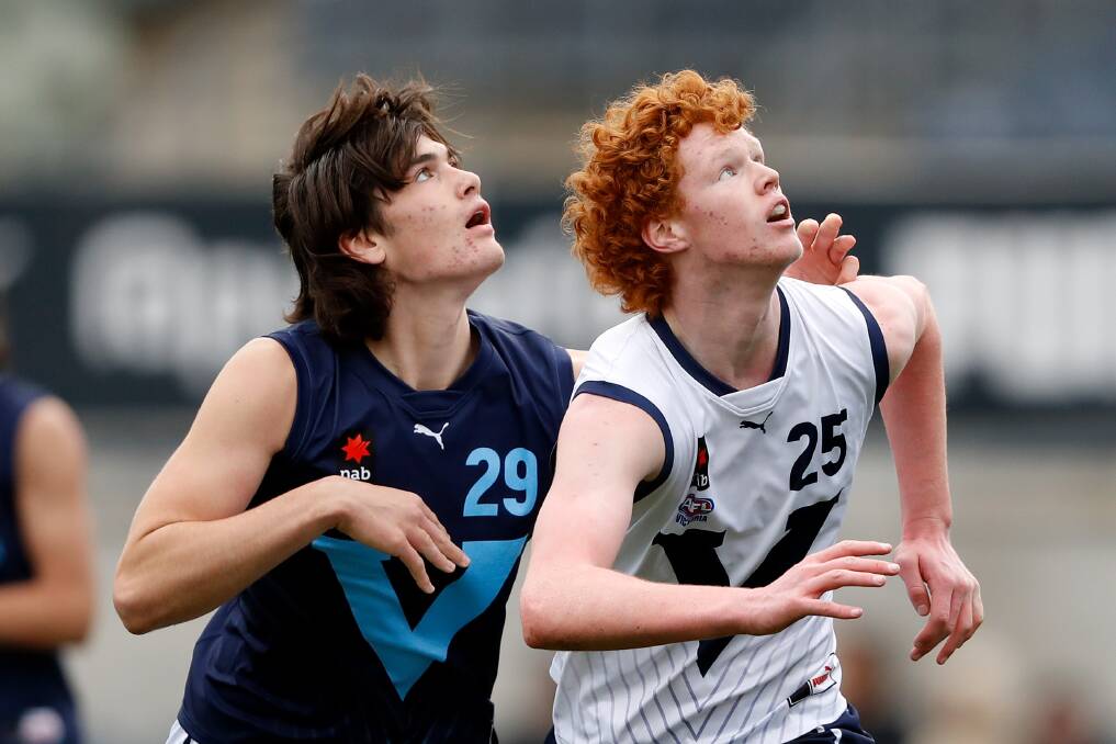EYES ON THE PRIZE: Cobden's Flynn Penry (right) contests a ruck contest for Vic Country against Vic Metro on Saturday. Picture: Getty Images 