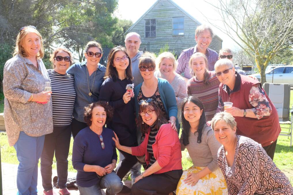 FAMILY FEEL: Port Fairy Medical Clinic staff in 2015, back row (left to right) Karen Ryan (receptionist), Dr Judy Carson (married to Andrew Gault), Alysha Phillips (receptionist), Dr Bambie Lee (registrar - no longer working at the practice), Ian Fowler (Bambies husband), Lisa Graham (receptionist), Dr Eleanor Donelan, Niamh Sutherland (Ians daughter), Dr Andrew Gault, Lyn Wright (receptionist/practice nurse, now retired), Alice Birrell (cleaner, now retired), front (left to right): Jennie Ciavola (receptionist, recently retired), Jenny McCarthy (Ian Sutherlands wife, part-time receptionist), Dr Xiuzhi Pham, Jane Anderton (receptionist).