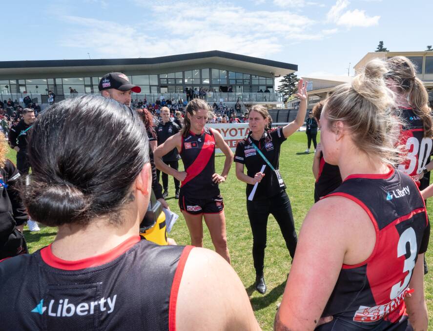 Warrnambool-raised Natalie Wood addresses Essendon's players during their AFLW game at Reid Oval in 2022. Picture by Sean McKenna 
