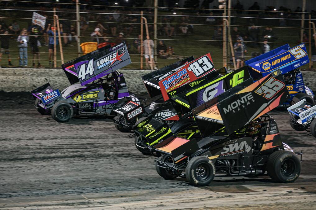 Cars will go four wide for the 50th classic A-Main before starting the 40-lap feature race. Picture by Sean McKenna 