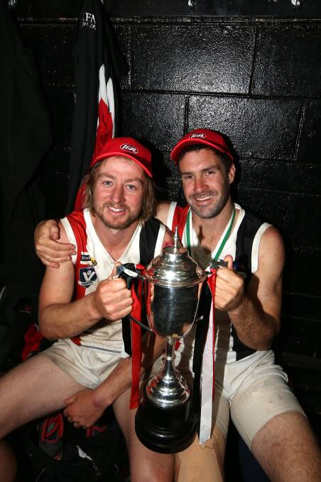 Good friends Ben Goodall and Chris McLaren after Koroit's 2014 premiership win. 