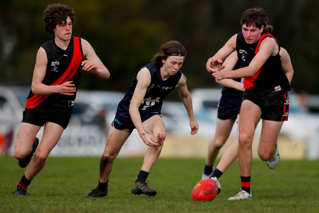 Warrnambool's Joseph Dowling competes against Cobden in an under 16 grand final. Picture by Chris Doheny 