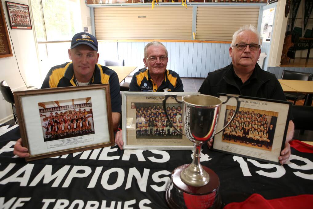 CLUB PRIDE: Mick McKinnon, Sandy White and Gerard Lynch wanted people know about North Warrnambool Eagles' long history ahead of its maiden grand final appearance in 2016.