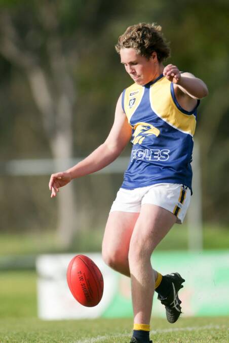 DAD'S CLUB: Noah Dowie plays juniors for North Warrnambool Eagles. His father Adam is senior coach. Picture: Chris Doheny 